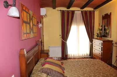 Cama o camas de una habitación en El Corral de Valero