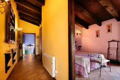 Una televisión o centro de entretenimiento en Apartamentos Teresana