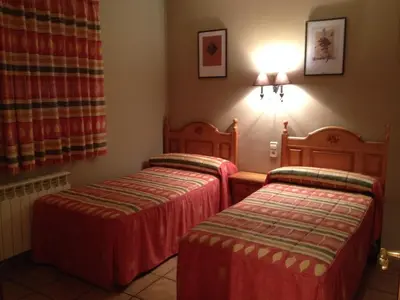 Cama o camas de una habitación en Apartamentos Residencial Fornocal