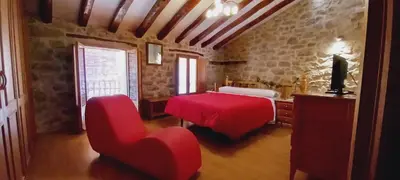 Cama o camas de una habitación en Casa rural la Posada ,Terra Alta, Matarraña.