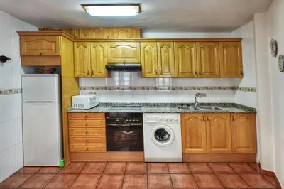 Una cocina o zona de cocina en Apartamentos Petronilla