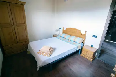 Cama o camas de una habitación en Ca de l'Estall