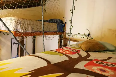 Cama o camas de una habitación en Cal Xulipa, casa familiar al centre de Tremp