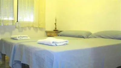Cama o camas de una habitación en Pensión Iglesias