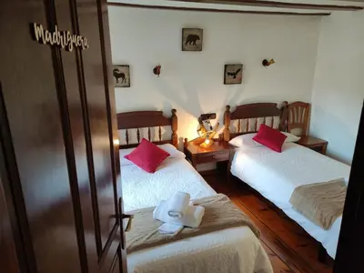 Cama o camas de una habitación en Casa de la Marmota