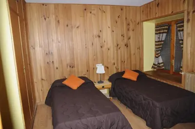 Cama o camas de una habitación en La Cabaña