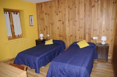 Cama o camas de una habitación en La Cabaña