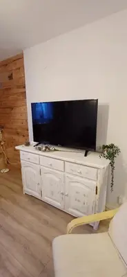 Una televisión o centro de entretenimiento en Apartamento El sarrio