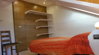 Cama o camas de una habitación en Apartamentos Casa Patro
