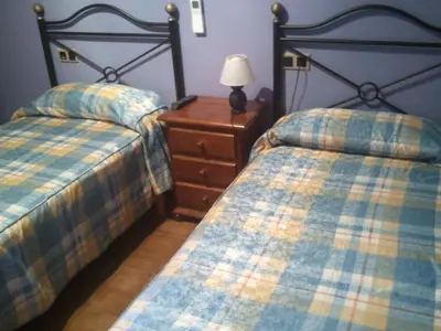 Cama o camas de una habitación en Hostal Can Barrina