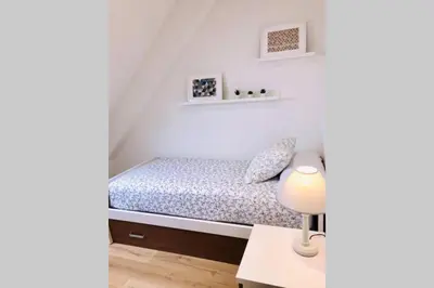 Cama o camas de una habitación en Ático en el Pirineo Aragonés Panticosa