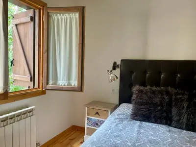 Cama o camas de una habitación en BPIRINEOS-La casita del Rebeco