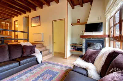 Zona de estar de CASA AIGUAMOIX de Alma de Nieve