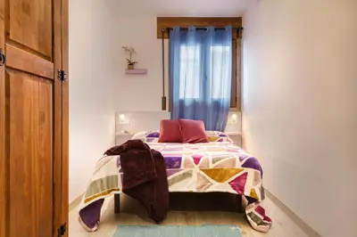 Cama o camas de una habitación en APARTAMENTO CASA PALOMA
