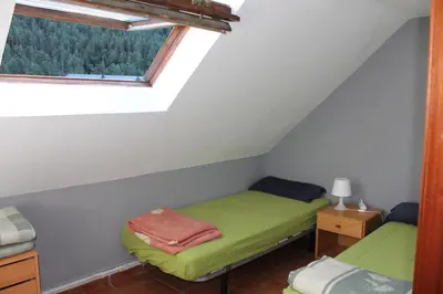 Cama o camas de una habitación en Albergue de Canfranc Estación