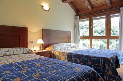Cama o camas de una habitación en Apartamentos Irati Olaldea
