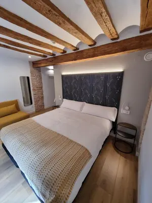 Cama o camas de una habitación en Hostal La Rúa