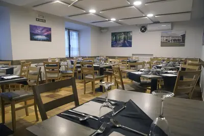 Un restaurante o sitio para comer en CASA SABINA