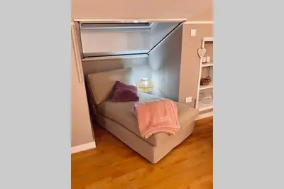 Cama o camas de una habitación en Mi Pequeña Buhardilla