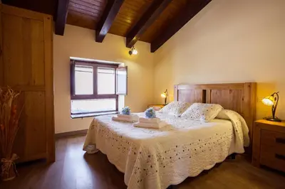 Cama o camas de una habitación en La Casona de Aldealobos