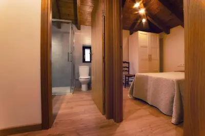 Cama o camas de una habitación en Apartamentos Camino de la Val