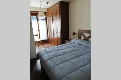 Cama o camas de una habitación en Espectacular ático duplex en Isil
