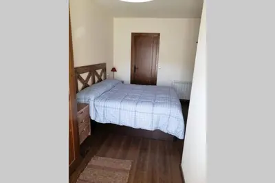 Cama o camas de una habitación en Espectacular ático duplex en Isil