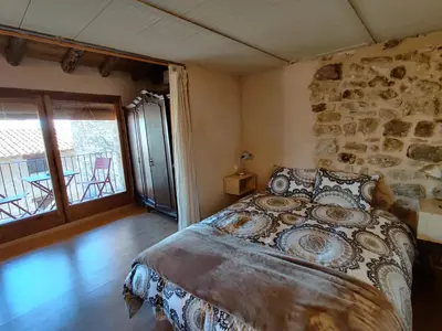 Cama o camas de una habitación en Loft Apartamento Rural La Fresneda - Casa Vidal