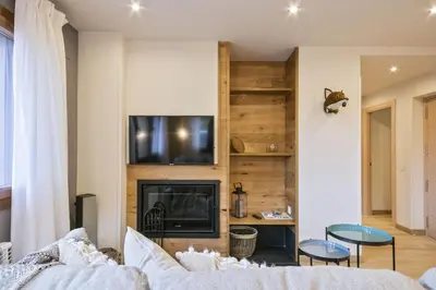 Una televisión o centro de entretenimiento en Luderna - Apartamento Meligar