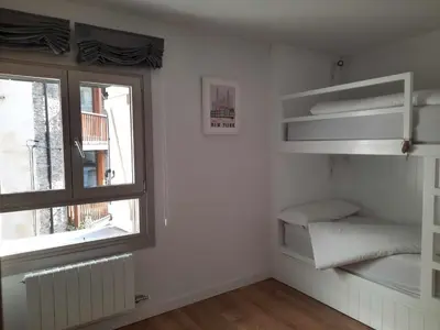 Cama o camas de una habitación en Casa El Cajico alojamiento vacacional en Panticosa
