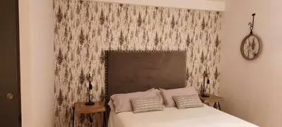 Cama o camas de una habitación en Casa El Cajico alojamiento vacacional en Panticosa