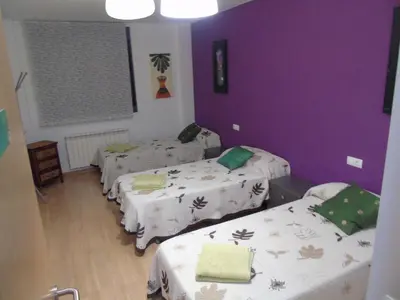 Cama o camas de una habitación en Apartamentos Mequedo