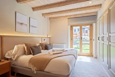 Cama o camas de una habitación en Luderna - Apartamento con jardín Crabera