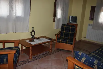 Una televisión o centro de entretenimiento en Casa Rural Laura