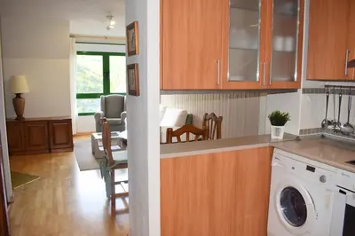 Una cocina o zona de cocina en Argualas - Triplex con piscina - By CARDI Suites
