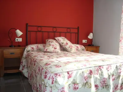Cama o camas de una habitación en Apartamentos Casa Modesto