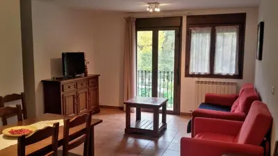 Una televisión o centro de entretenimiento en Apartamentos Mobison
