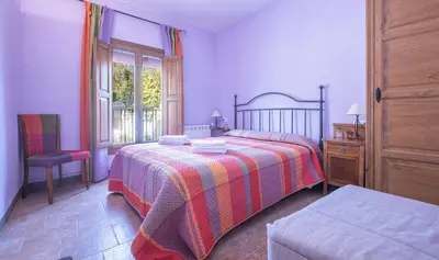 Cama o camas de una habitación en Cal Giral II