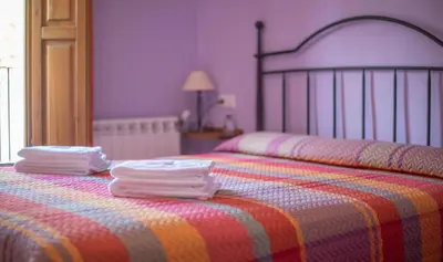 Cama o camas de una habitación en Cal Giral II