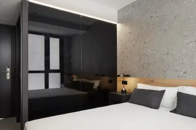 Cama o camas de una habitación en Hostal Espoz y Mina