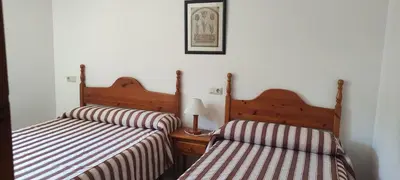 Cama o camas de una habitación en Centro Torla 4pax Apartamento