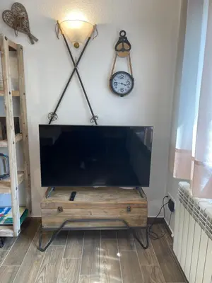 Una televisión o centro de entretenimiento en DUPLEX ALPINO