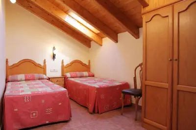 Cama o camas de una habitación en Apartamentos Chuanon