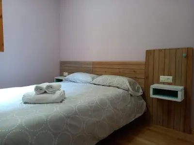 Cama o camas de una habitación en Apartamentos Tuara