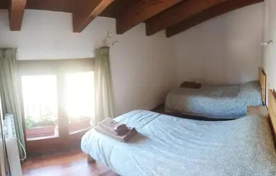 Cama o camas de una habitación en Apartamentos Rurales Rad Icarium