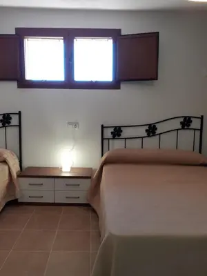 Cama o camas de una habitación en Casa Biñuales