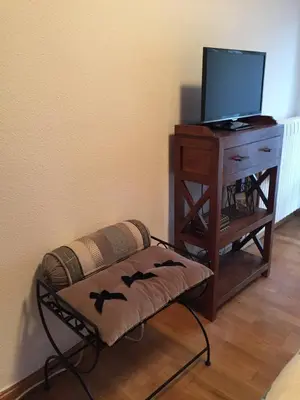 Una televisión o centro de entretenimiento en Apartamento Marbore