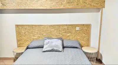Cama o camas de una habitación en Apartament MACABEU CIM apartaments