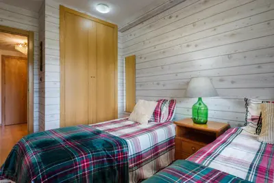 Cama o camas de una habitación en Peña Sabocos II Apartamento Turístico Panticosa