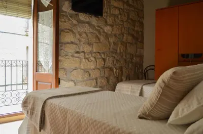 Cama o camas de una habitación en CAL MILIO